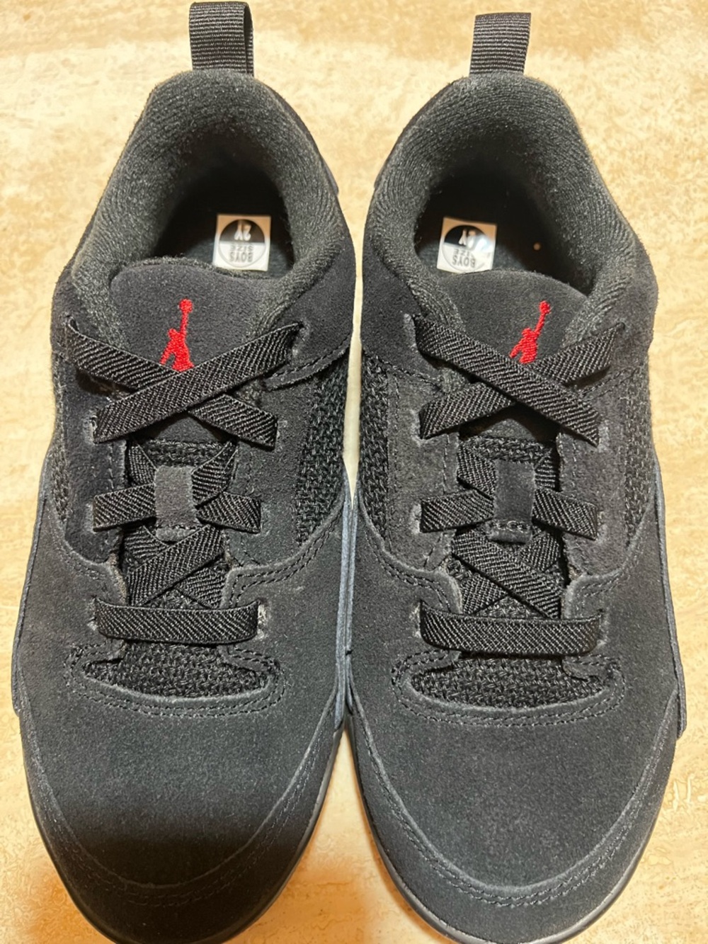 Jordan Black Suede Low-Top Sneakers with Red Jumpman Accent